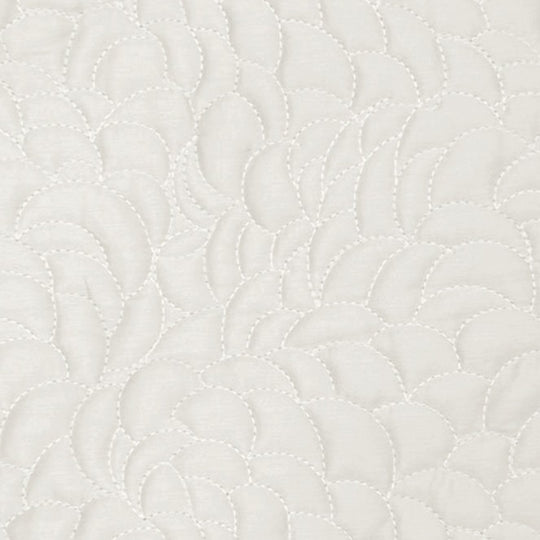 Swatch of the Shells Coverlet Set in White from the Judith Leiber Couture by Ann Gish collection, showing the scalloped quilted pattern and texture. - YSETCOSHK-WHI YSETCOSHQ-WHI
